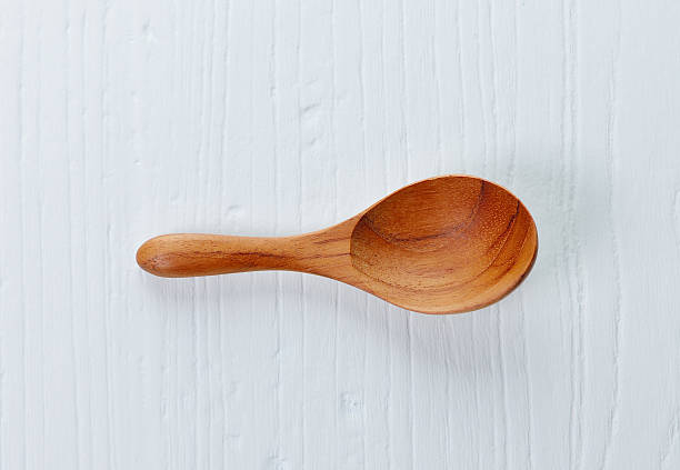 istock Wooden spoon and wood board background 483896878