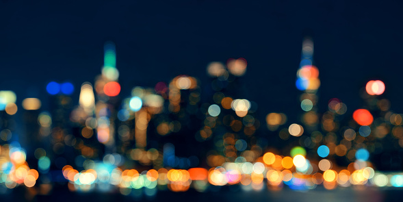 Midtown Manhattan skyline bokeh at dusk panorama over Hudson River