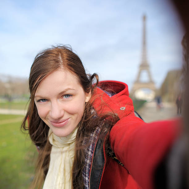istock Woman taking selfie near the Eiffel tower 483901938
