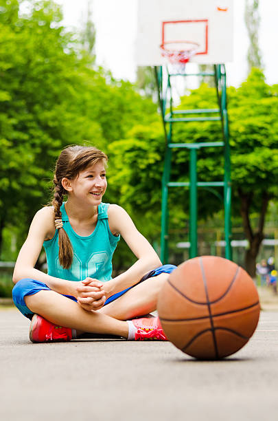 istock Beautiful confident young female basketball player 483905630