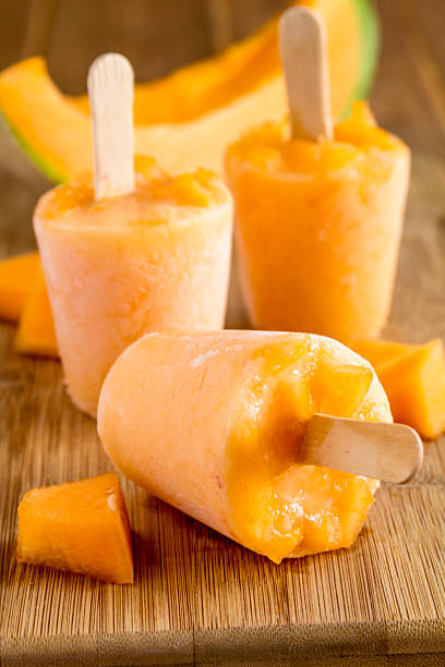 istock Homemade Fresh Pureed Fruit Frozen Popsicles 483906356