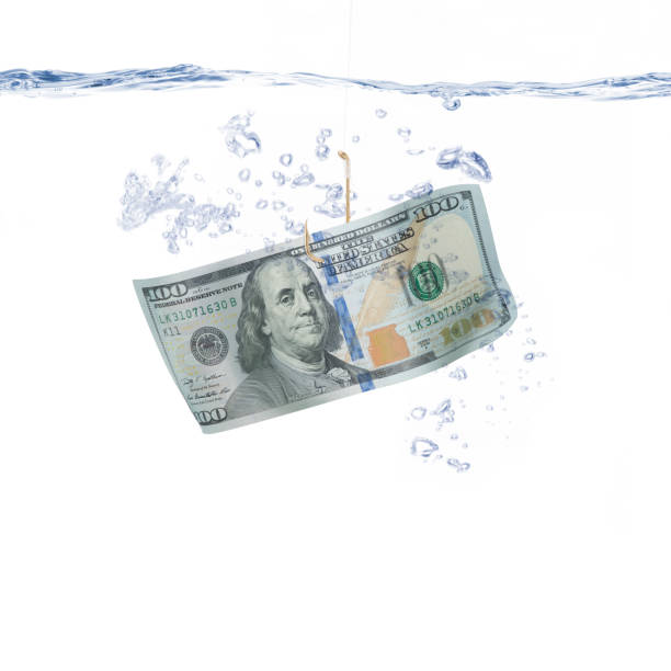 istock Money Hanging from a Fishing Hook 483910594