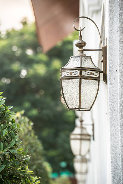 istock Old iron street lantern on wall 483911051