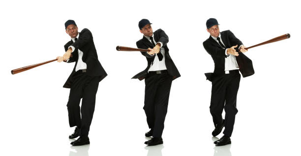istock Businessmen in action with baseball bat 483912201