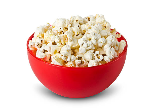 Bowl of popcorn isolated on white background Bowl of popcorn isolated on white background chewy photos stock pictures, royalty-free photos & images