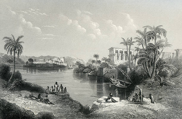 The Islands of Philae An engraving of Philae showing Trajan's Kiosk (right) and the Temple of Isis (left) in their original locations. Following the construction of the Old Aswan Dam in 1902, the temple complex was moved to Agilkia Island to protect it against flooding.  temple of philae stock illustrations