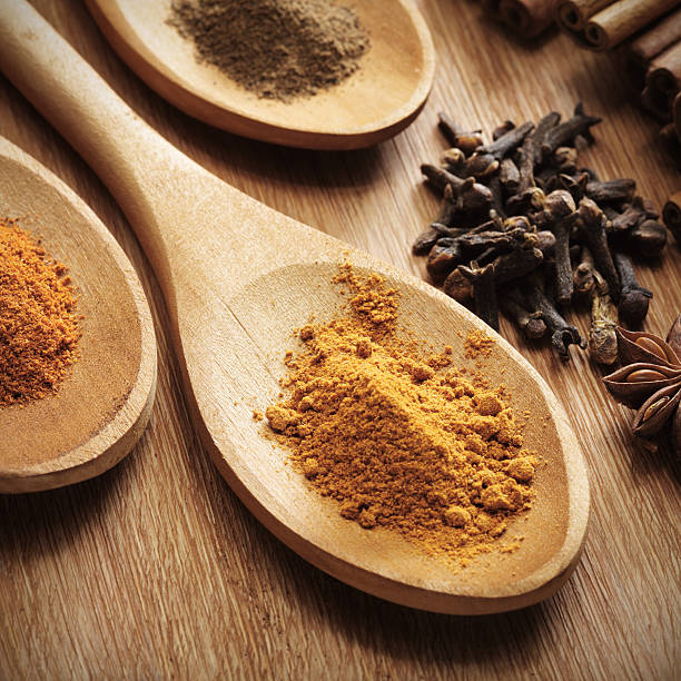 istock Herbs and Spices over wooden background 483913447