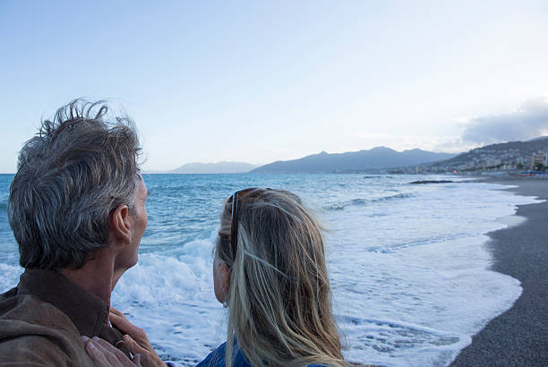 istock Couple look out over Mediterranean coastline 483913628