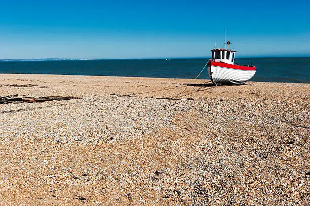 Fishing boat on the beach in Dungeness, Kent, England