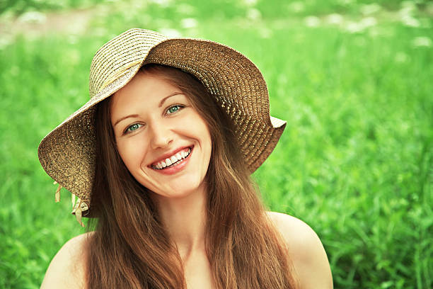 istock Beautiful woman with hat 483916425