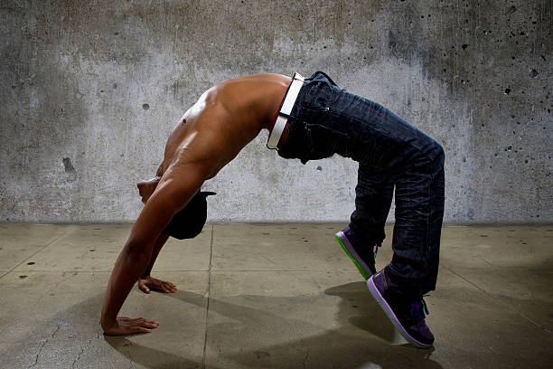 istock Urban Man Doing Flexible Yoga 483916700