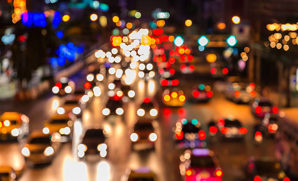 istock abstact blur bokeh of Evening traffic jam on road. 483916748