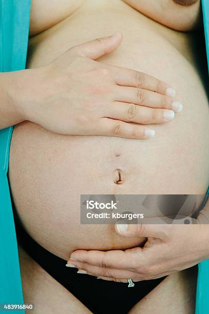 Pregnant Woman Stock Photo - Download Image Now - 2015, Adult, Adults Only