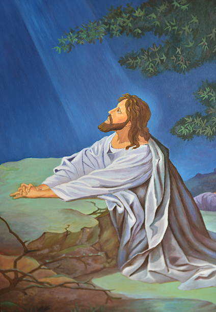 Jesus praying stock photo