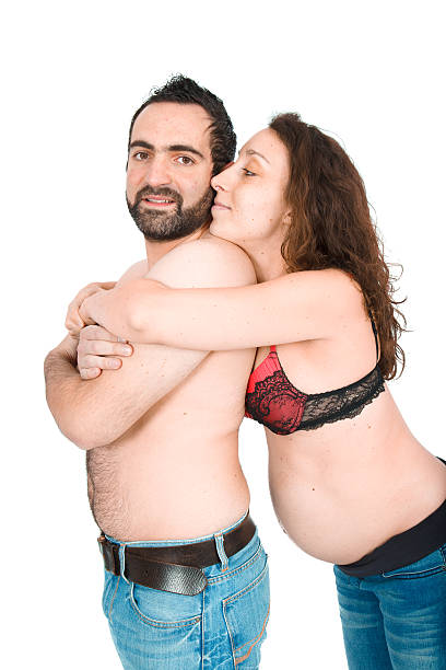 istock Man posing with his pregnant wife 483917431