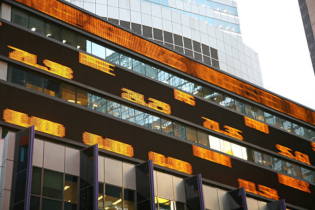 istock Electronic Stock TIcker On Wall Of Building 483917499