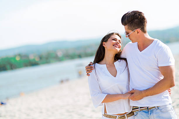 istock Romantic couple holding hands 483929660
