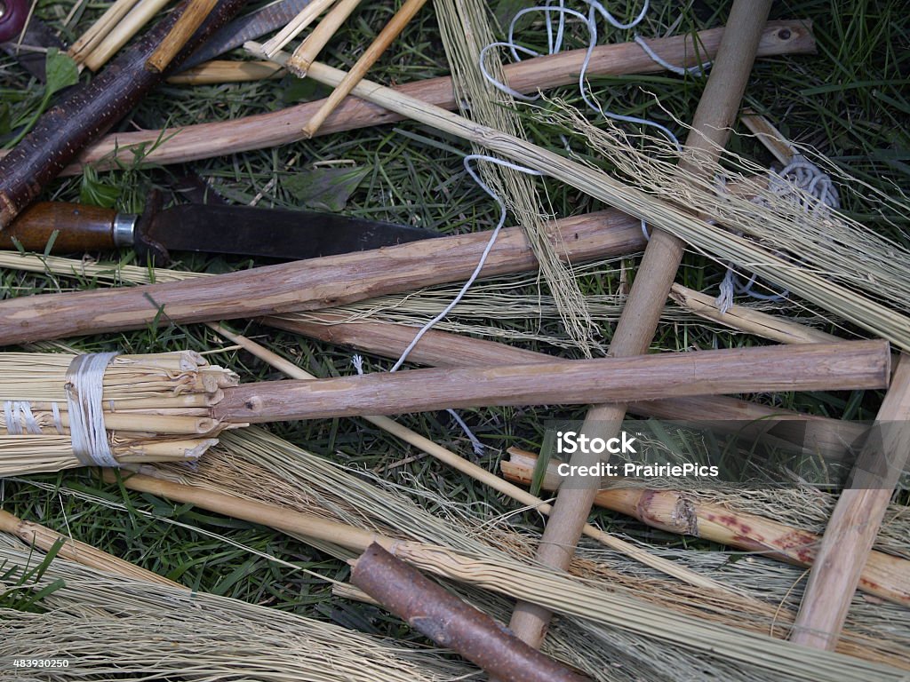 Old Fashioned Brooms Handmade corn stalk brooms in the old fashioned way, made by an old farmer.  2015 Stock Photo