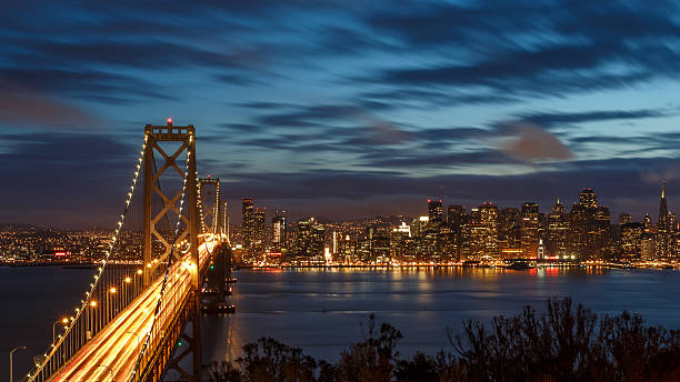 istock San Francisco skyline and bay bridge at night 483930584