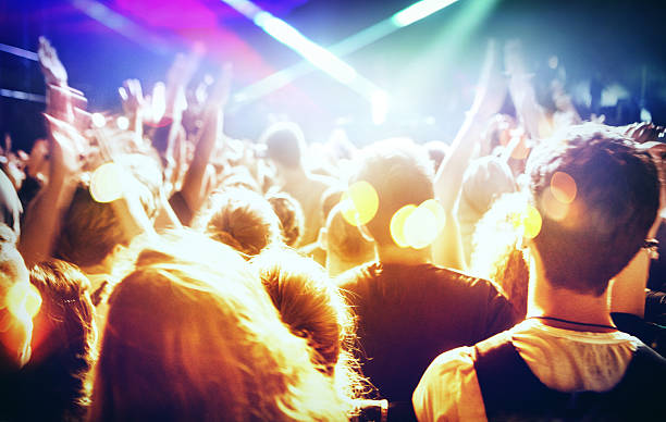 istock People at concert party. 483933738