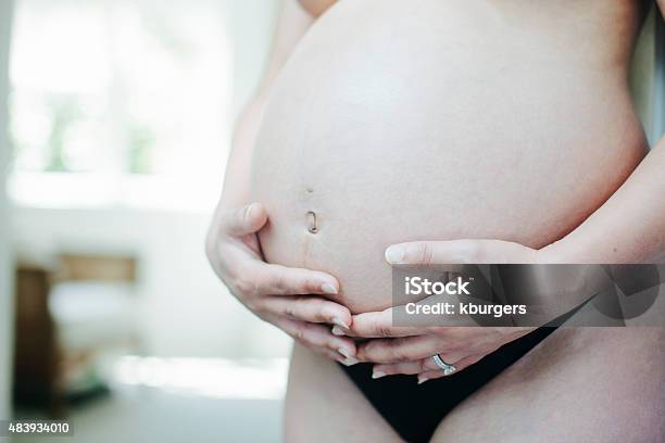 Pregnant Woman Stock Photo - Download Image Now - 2015, Adult, Adults Only
