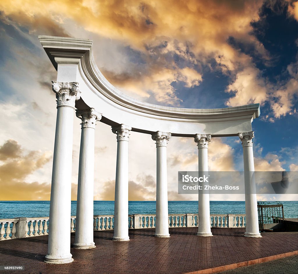 Ancient Greek columns Ancient Greek columns at sunset 2015 Stock Photo