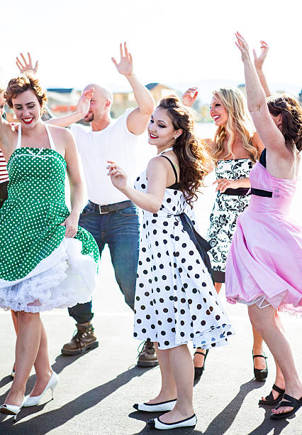 istock Group of Friends Dancing Outside (1950's) 483947342
