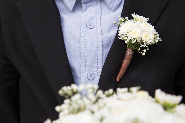 istock White Flower on Chest Groom 483955058