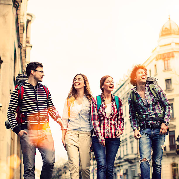 istock Happy Backpackers in the city. 483955983