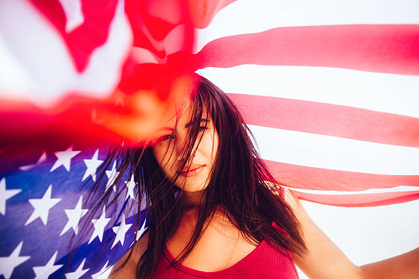 Serious woman with american flag