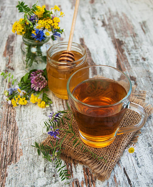 istock Cup of tea, honey and flowers 483956674