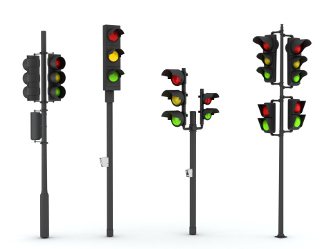 Isolated traffic lights with four different models... Suitable to use in traffic related works. High resolution 3D rendering.