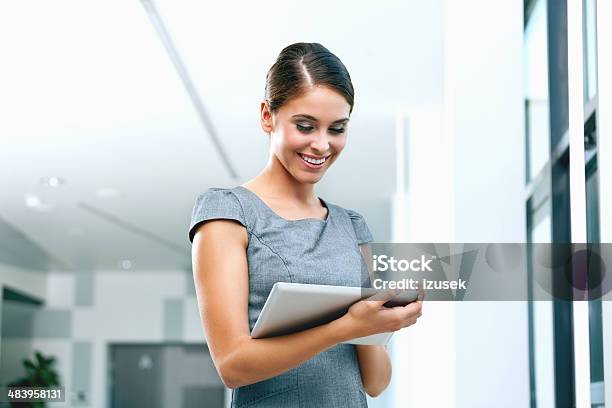 Businesswoman With Digital Tablet Stock Photo - Download Image Now - 25-29 Years, Adult, Adults Only