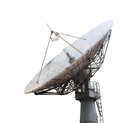 Radio antenna dishes of the Very Large Array radio telescope at  sunset
