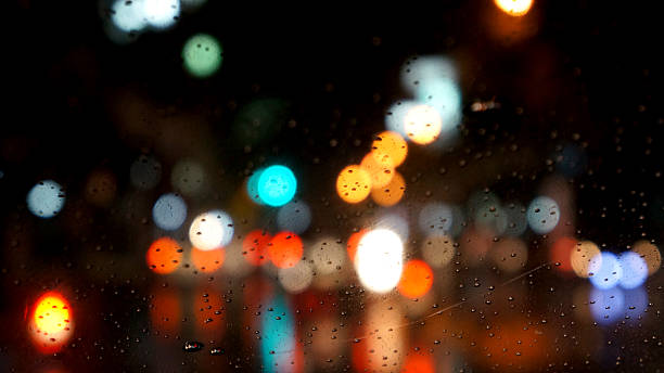istock Driving in the rainy night, defocused 483958859