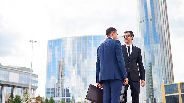istock Businessmen in city 483959552