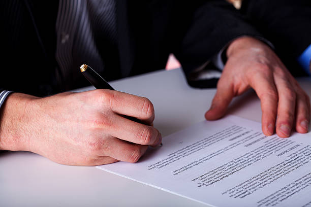 istock Signing an agreement closeup 483959713