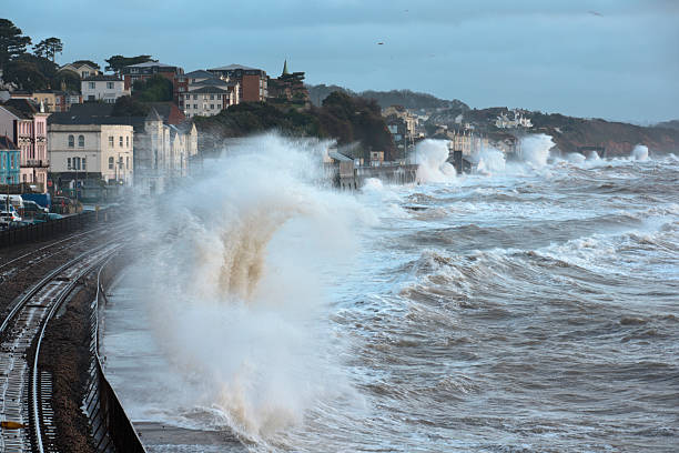 Large waves batter Dawlish during high tide stock photo