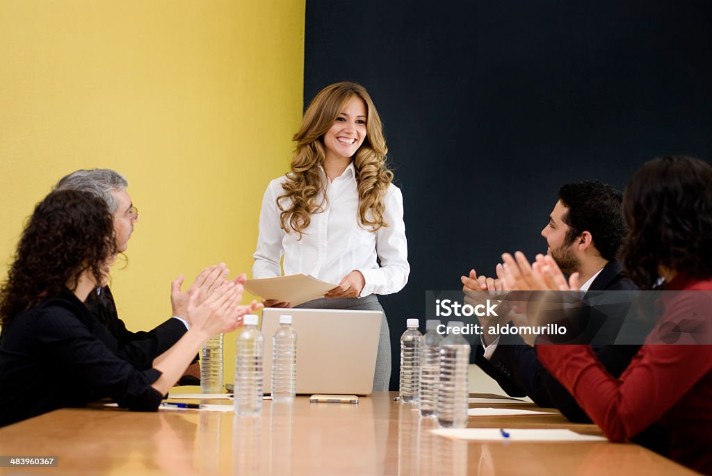 Attractive businesswoman Clapping Stock Photo