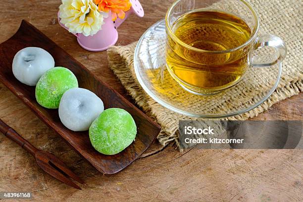 Daifuku Greentea And Sesame Filling With Cup Of Tea Stock Photo - Download Image Now