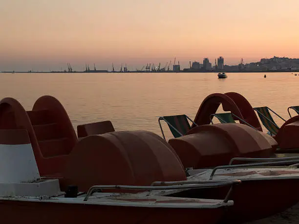 Pedal-boats at sunset - Harbour of Durres / Drach in the background, landscape-Albania