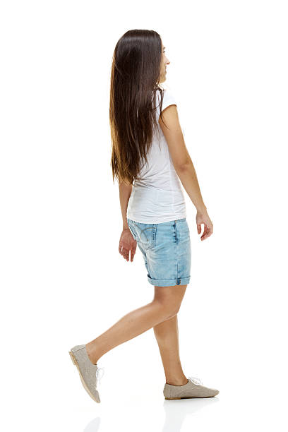 istock Rear view of woman walking 483965562