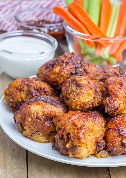 istock Roasted chicken with blue cheese dressing, celery and carrot sticks 483967062