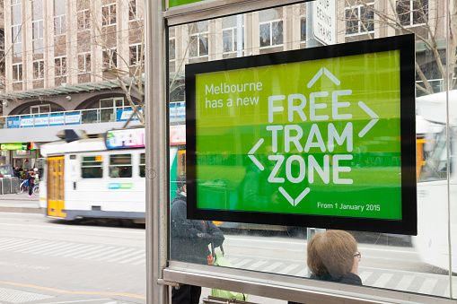 Melbourne, Australia - Aug 8, 2015: Free tram zone sign in a tram station in downtown Melbourne, Australia. Travel on trams within this zone is free.