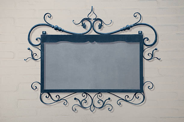 istock blue signboard hanging on white brick wall 483974394