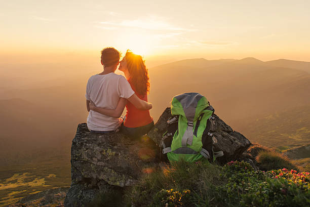 istock Happy couple enjoy beautiful view in the mountains 483977778