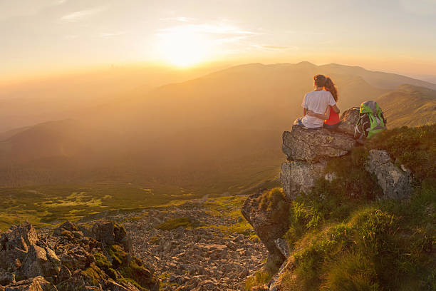 istock Happy couple enjoy beautiful view in the mountains 483978066