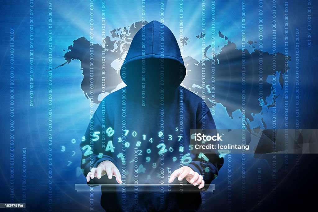 Computer hacker silhouette of hooded man Computer hacker silhouette of hooded man with binary data and network security terms Threats Stock Photo