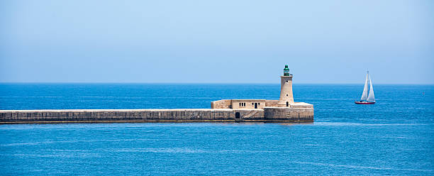 istock lighthouse of Valletta port 483978154