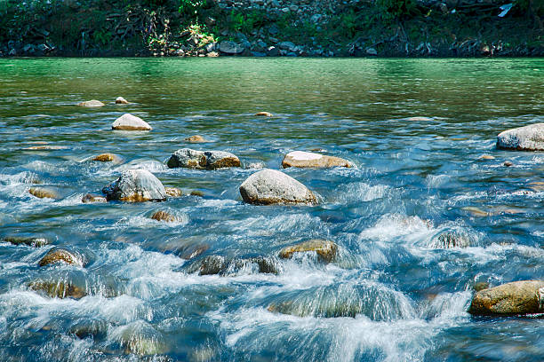 istock mountain river flow stone landscape long exposure photo, blurred. Georgia 483978628